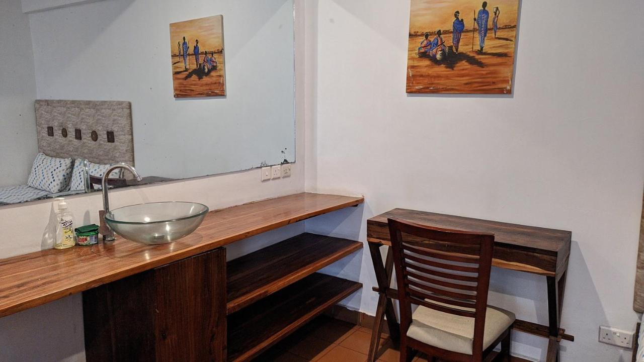 A Lovely Studio Apartment With Gym And Pool Access ดาร์เอสซาลาม ภายนอก รูปภาพ